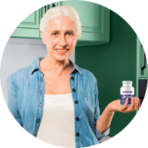 Corinne F. holding a VisiFlora bottle